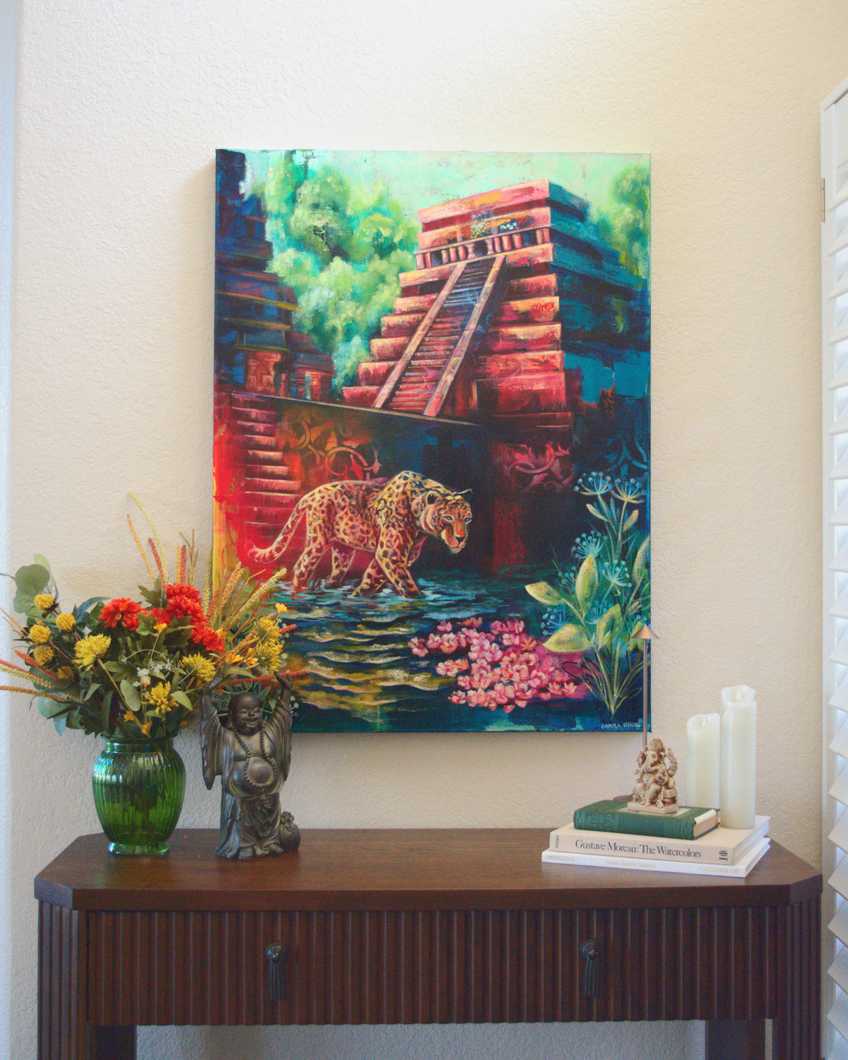 The Sacred Watcher by Carma Visions, styled above a console table