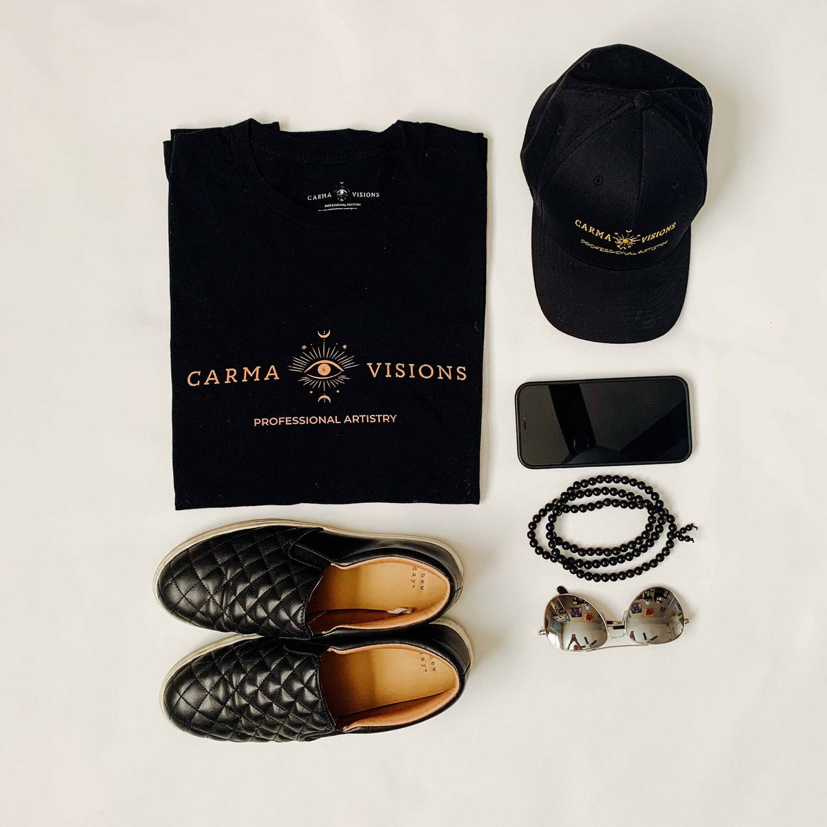 Carma Visions t-shirt in solid black triblend, folded flat lay